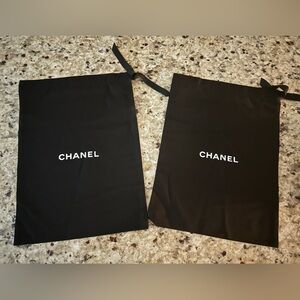 Pair of dust bags marked Chanel